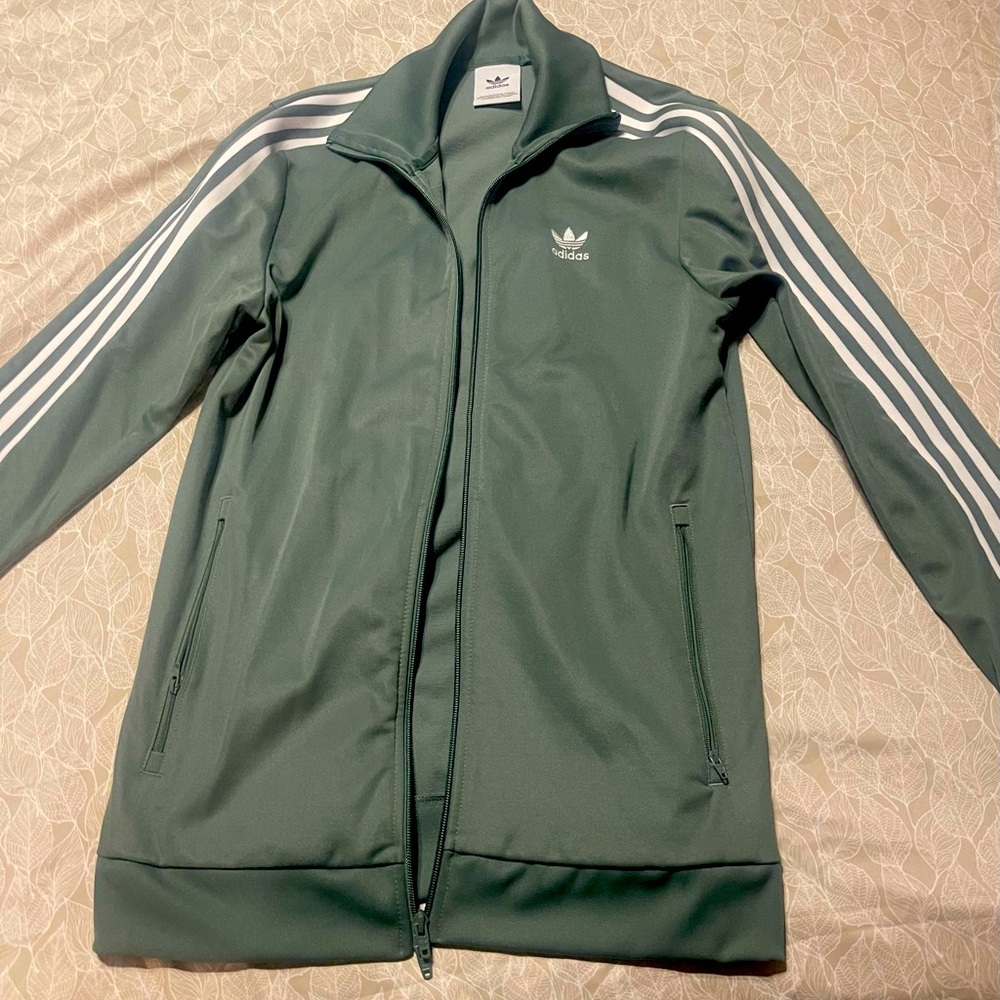 Green women’s adidas track jacket